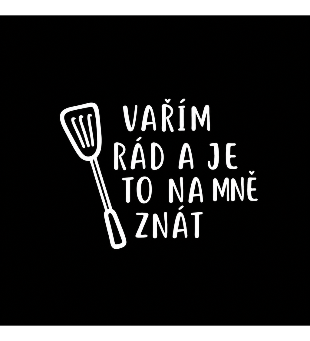 Zástěra černá s nápisem Vařím rád a je to na mě znát